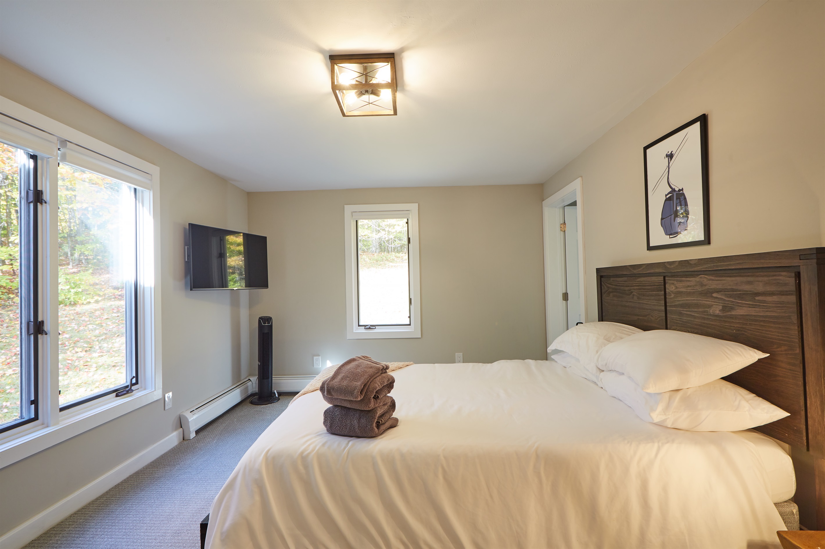 Beautiful light-filled first-floor queen bedroom with a connecting bathroom