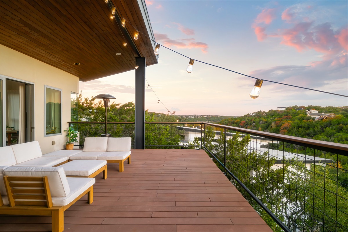 Expansive balcony with comfortable outdoor seating