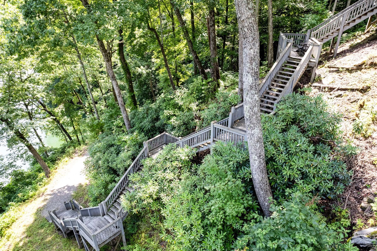 The long, I mean long set of stairs leading to the fire-pit, dock, and kayaks. Prepare your leg muscles you're in the mountains!