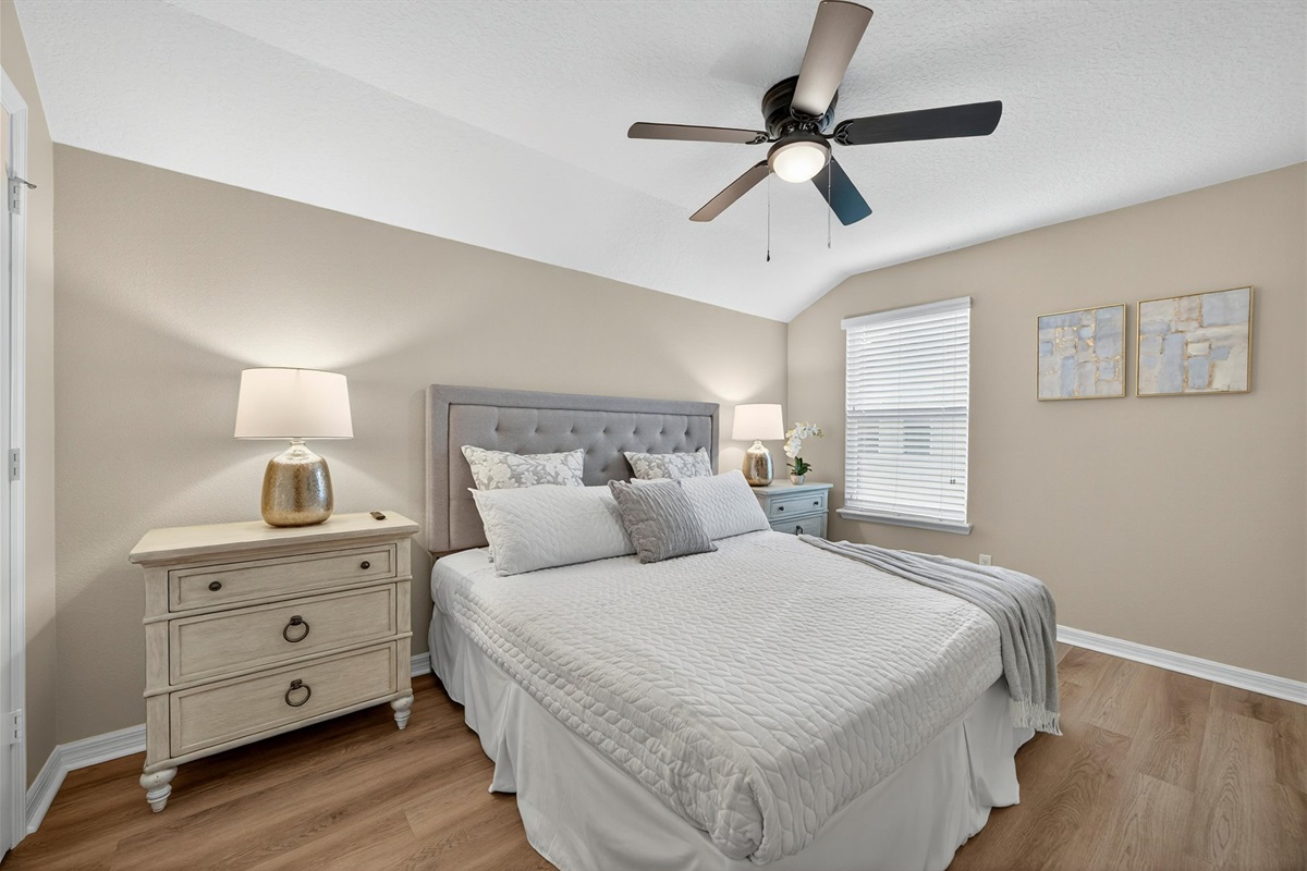 Elegant bedroom with modern furnishings and peaceful ambiance.