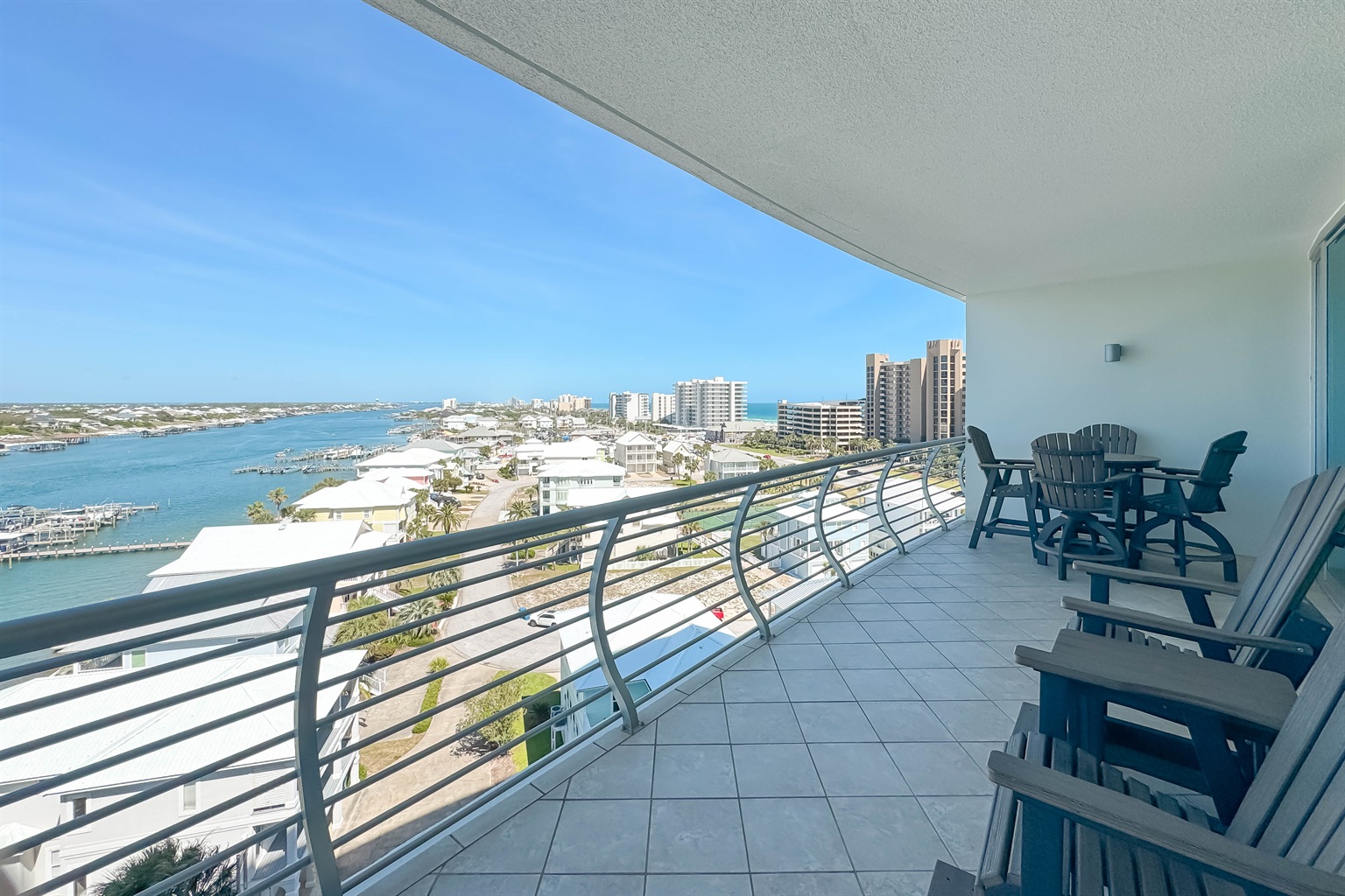 This architectural design seamlessly integrates indoor and outdoor living with a spacious balcony offering expansive water views. The perfect extension of the living space for enjoying the coastal ambiance.