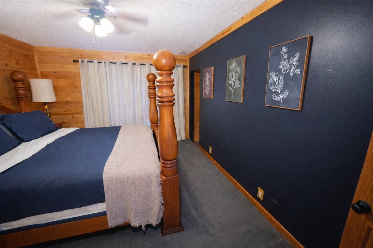 King bed with walk out access to Hot Tub