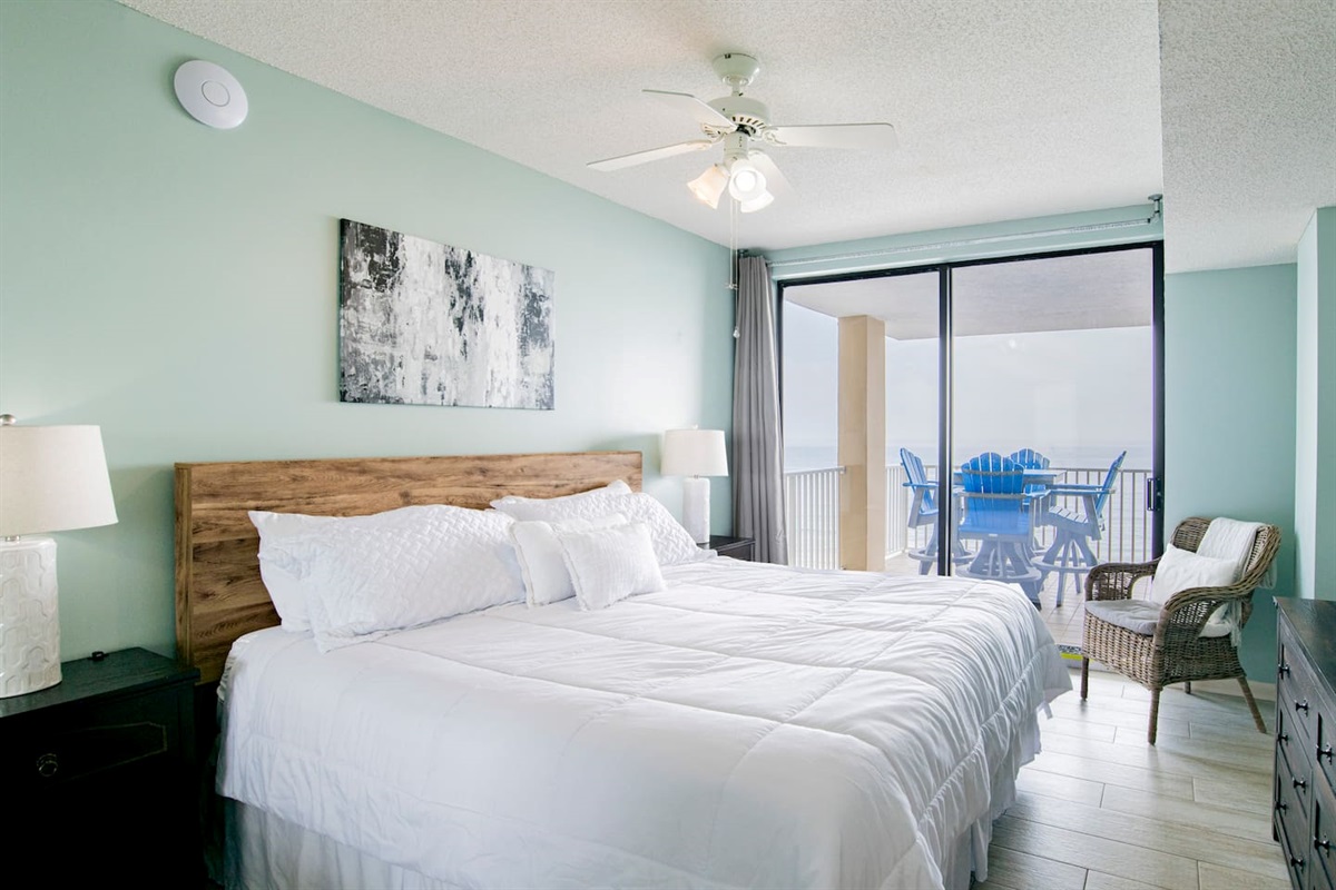 Brand new King Tempurpedic master bed, with direct view out to the ocean. You can hear the waves from both bedroom and living room!