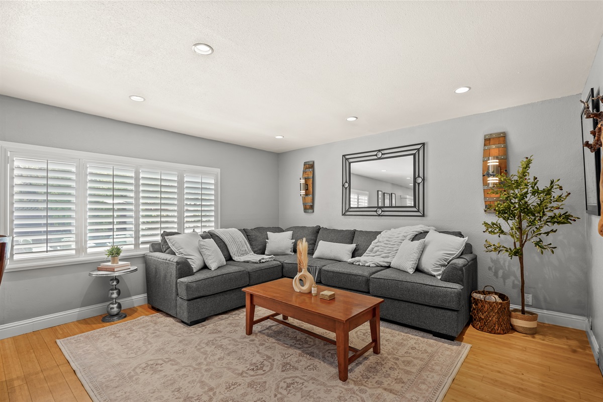 Additional sitting area near the front entrance offering a quiet and comfortable space to relax, read, or gather with friends and family.