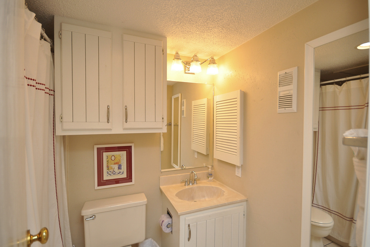 Primary bathroom has tub/shower combo.