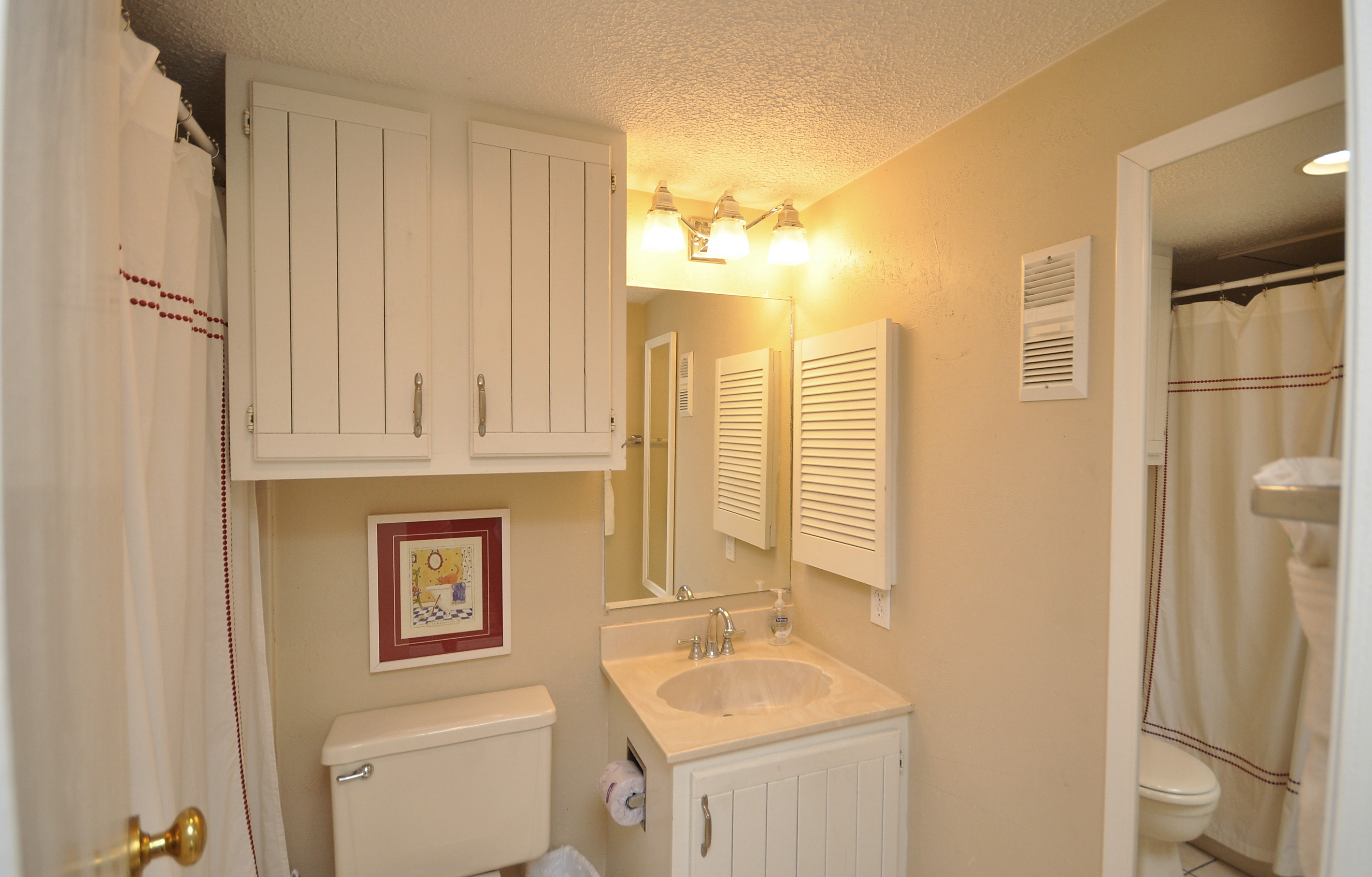Primary bathroom has tub/shower combo.