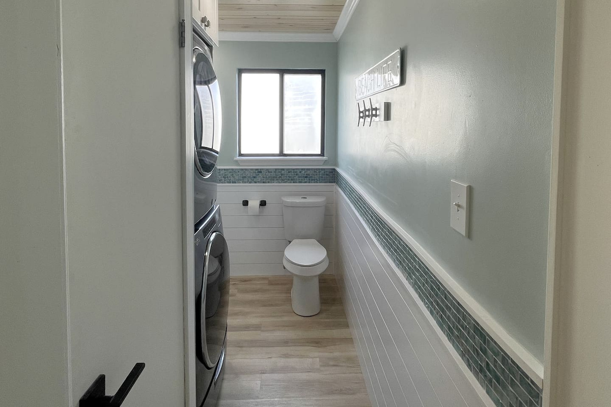 Use your main level half bath without going upstairs &mdash; keeps the group moving and the morning routine from becoming a bottleneck.