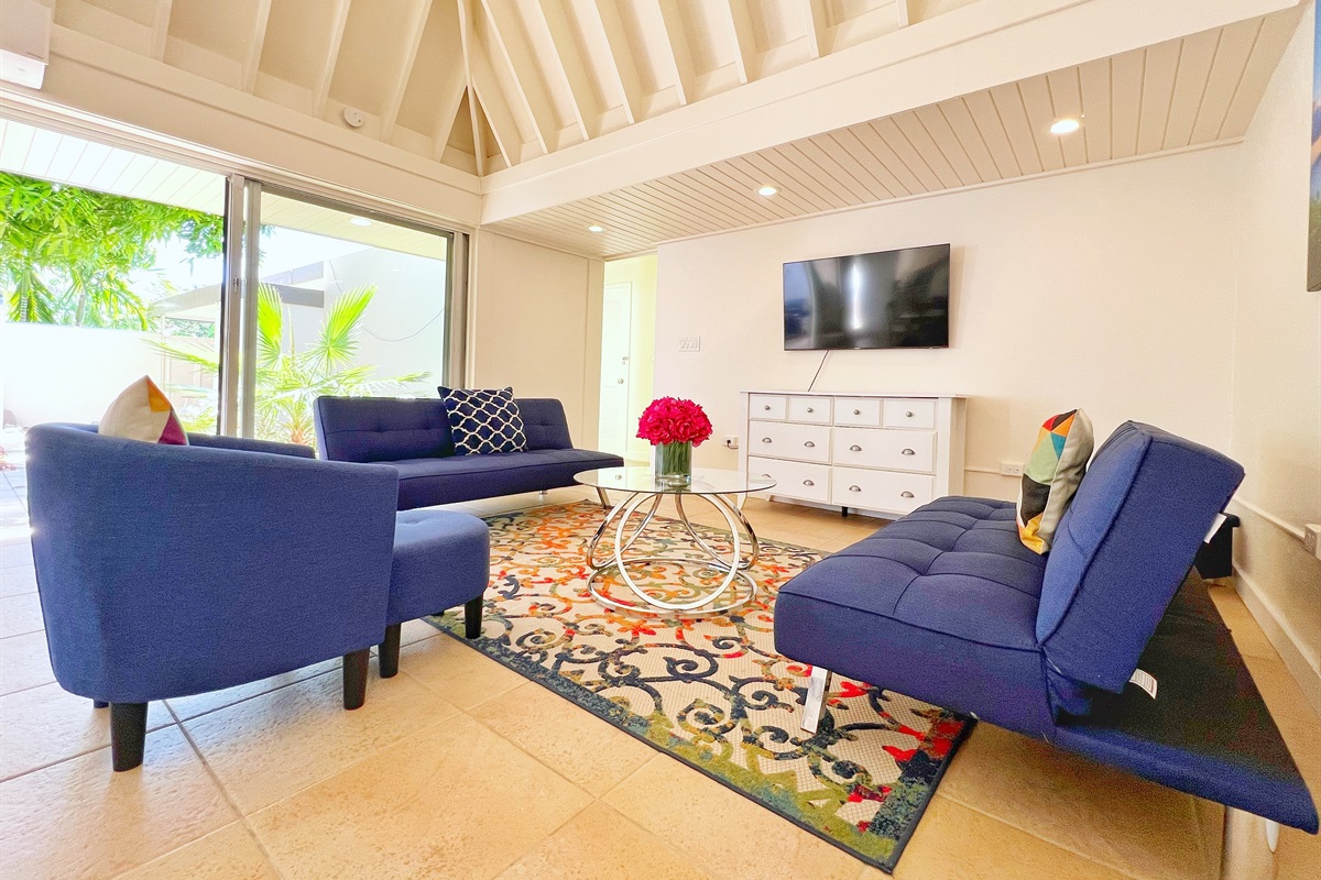 Whether you're watching TV or enjoying the company of loved ones, this living room is made for comfort.