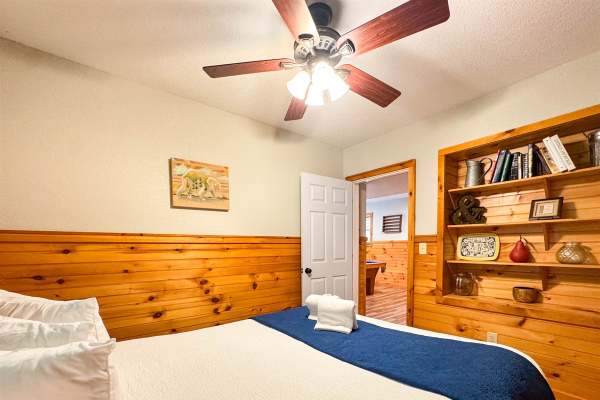 the Lower level bedroom is off the game room. It features a hybrid memory foam bed with shredded bamboo pillows. 