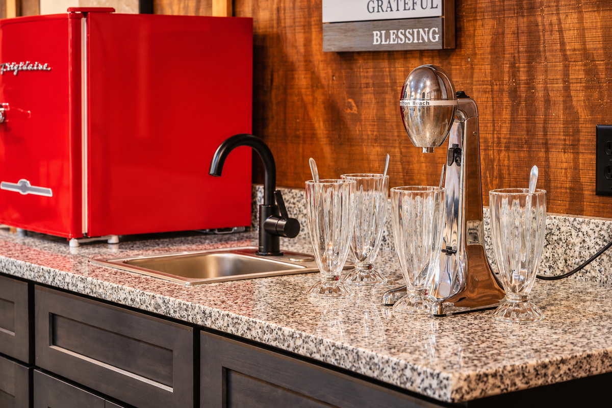 Whip up chocolate shakes on the vintage malt mixer and serve in soda glasses.