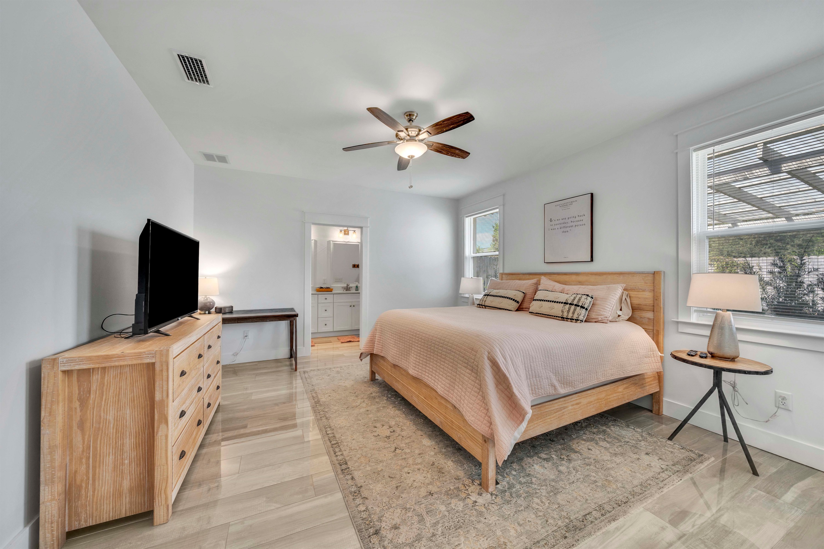 Keep your daily routine on track with plenty of floor space to stretch or roll out a yoga mat and get settled in with working desk and lamp.