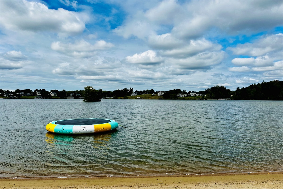 Splash into fun! Guests can enjoy hours of play on the floating water trampoline right off the sandy shoreline.