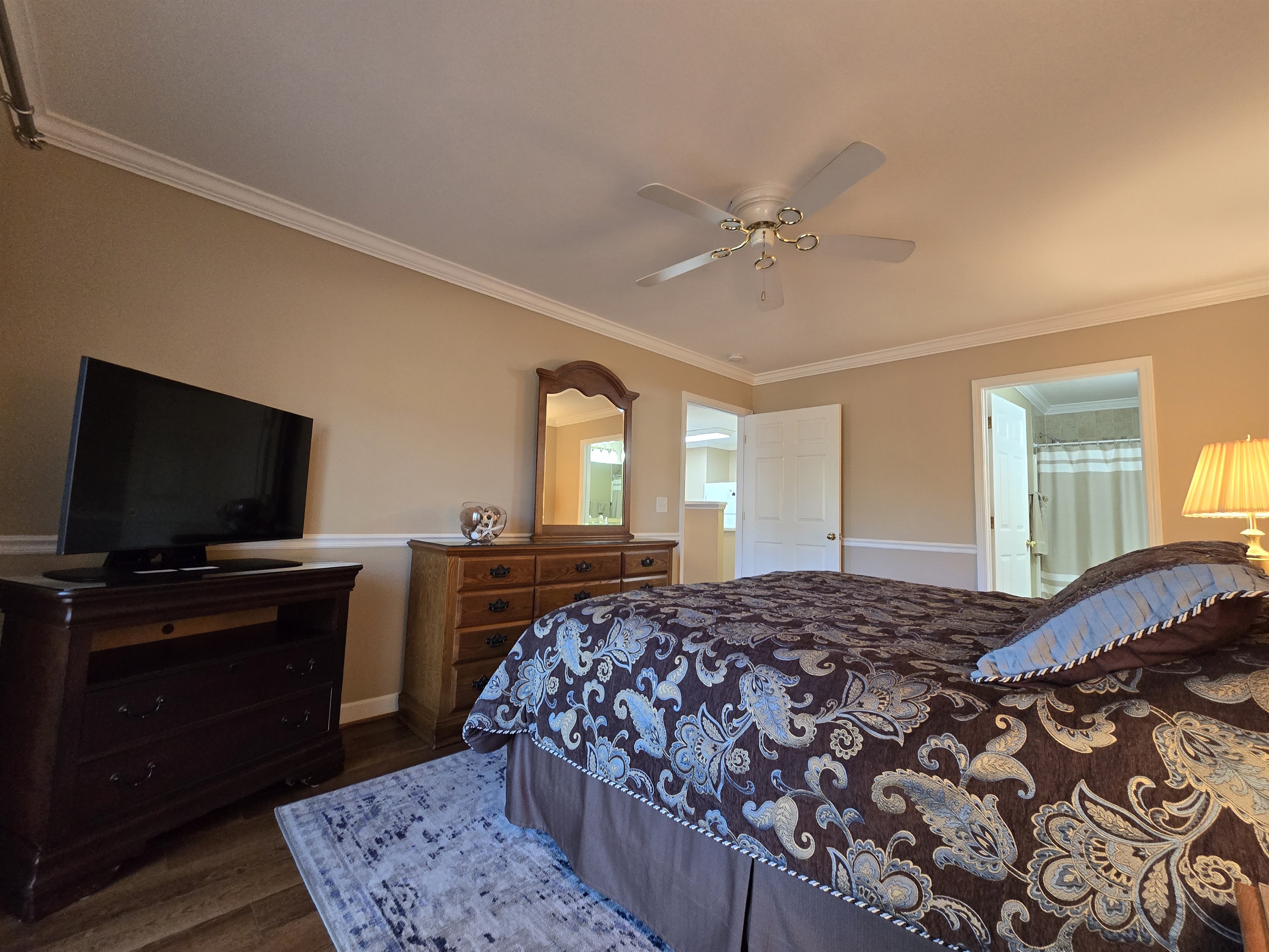 Master suite dresser storage and TV