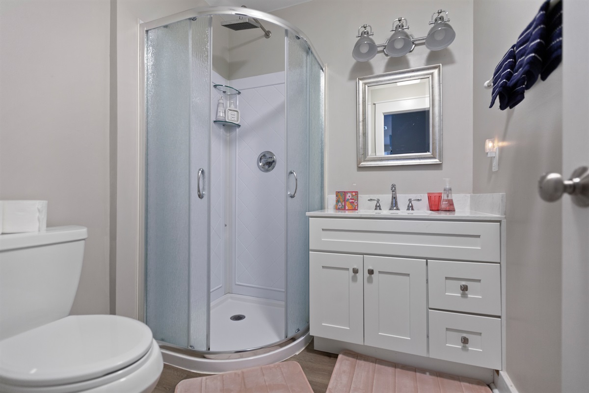 Second full bathroom with shower and fresh finishes - ideal for families or couples traveling together