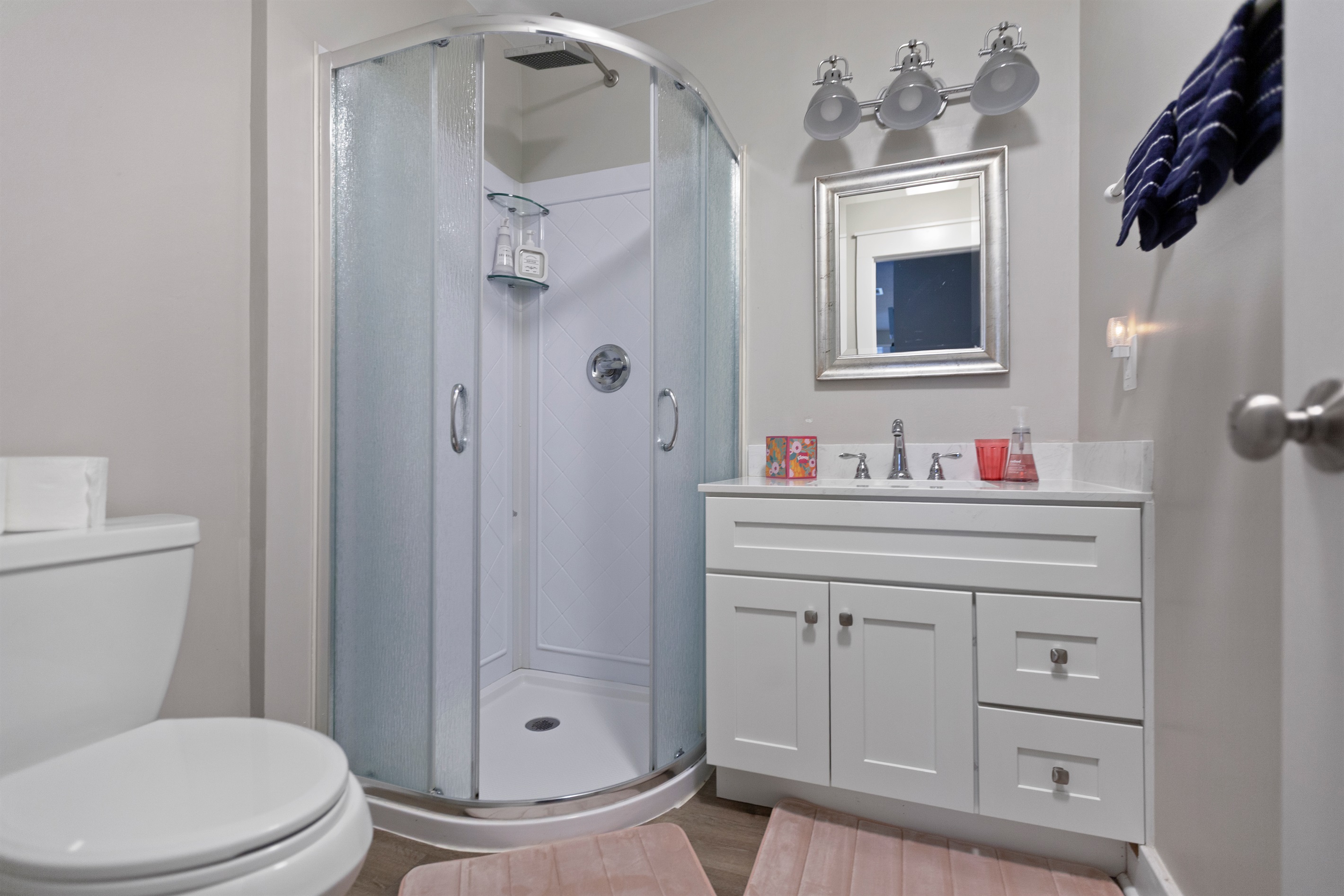 Second full bathroom with shower and fresh finishes - ideal for families or couples traveling together