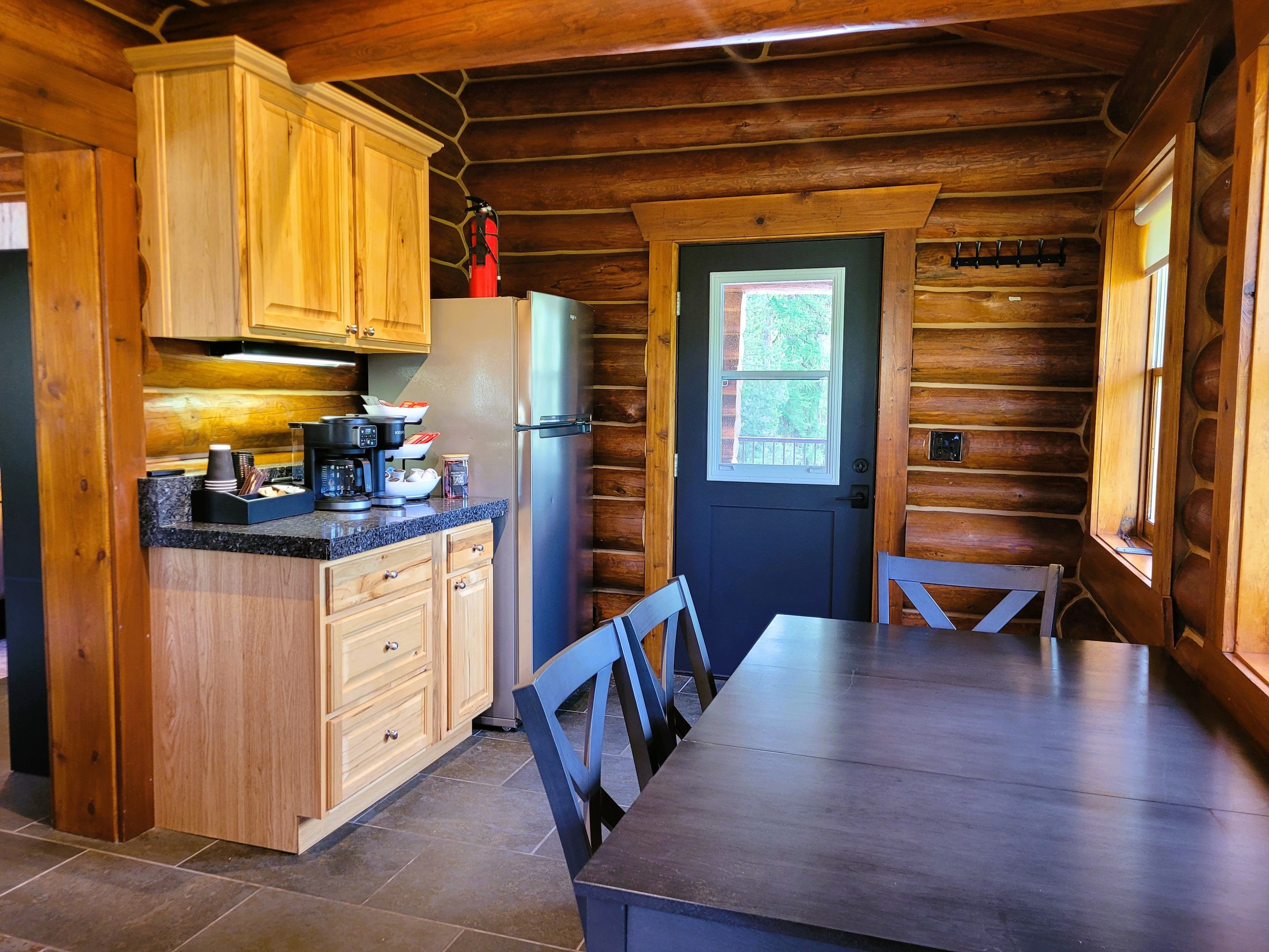Cozy space to cook and eat, with all the standard kitchen essentials.