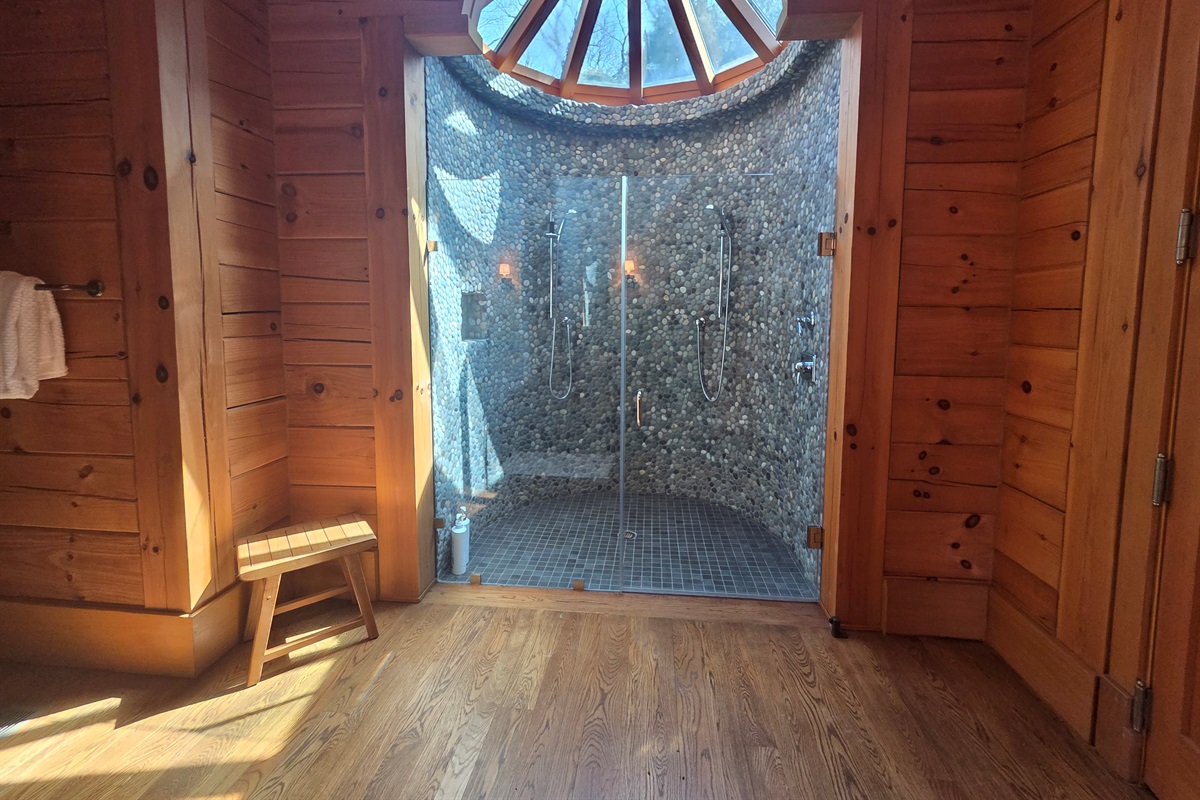 Enjoy a spa-like experience with a large walk-in shower located in the third bedroom’s bathroom.