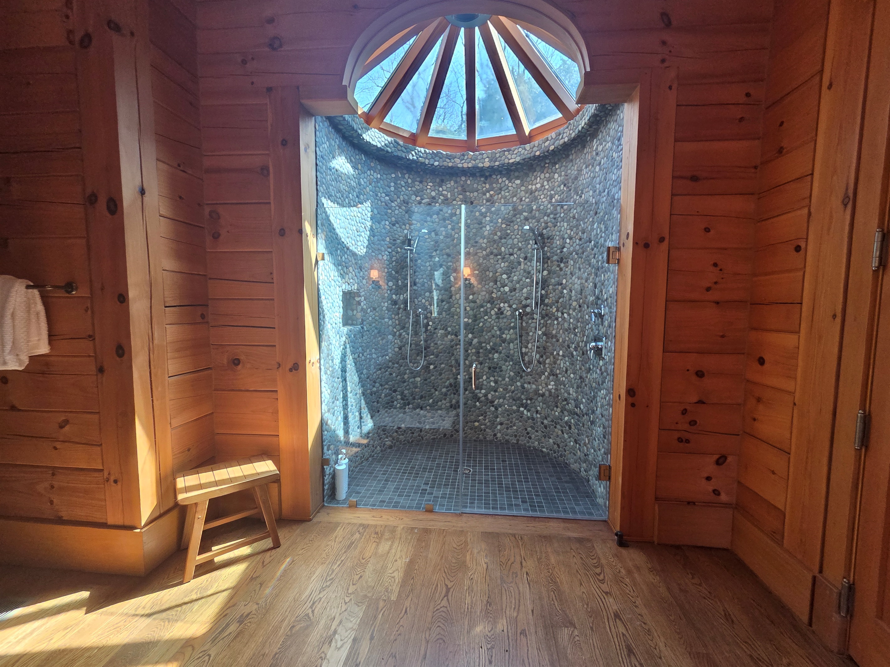 Enjoy a spa-like experience with a large walk-in shower located in the third bedroom’s bathroom.