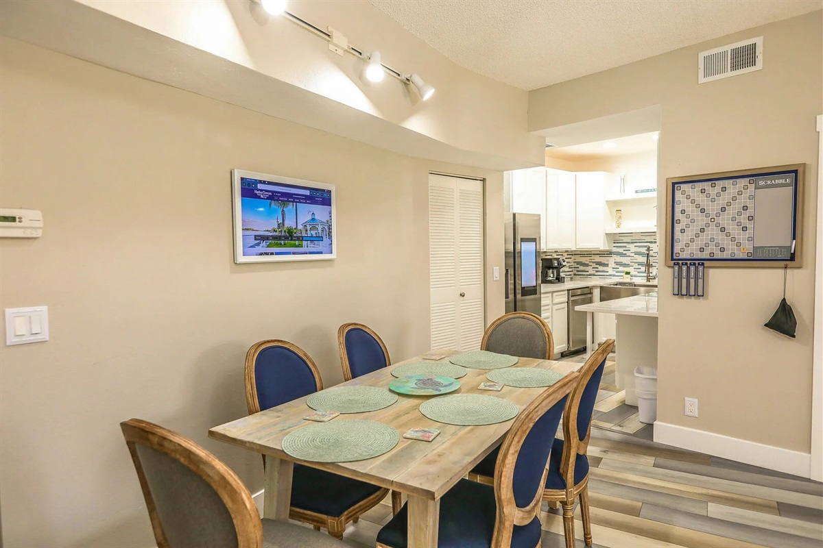 Inviting dining space with subtle coastal tones for shared meals and relaxed evenings. 