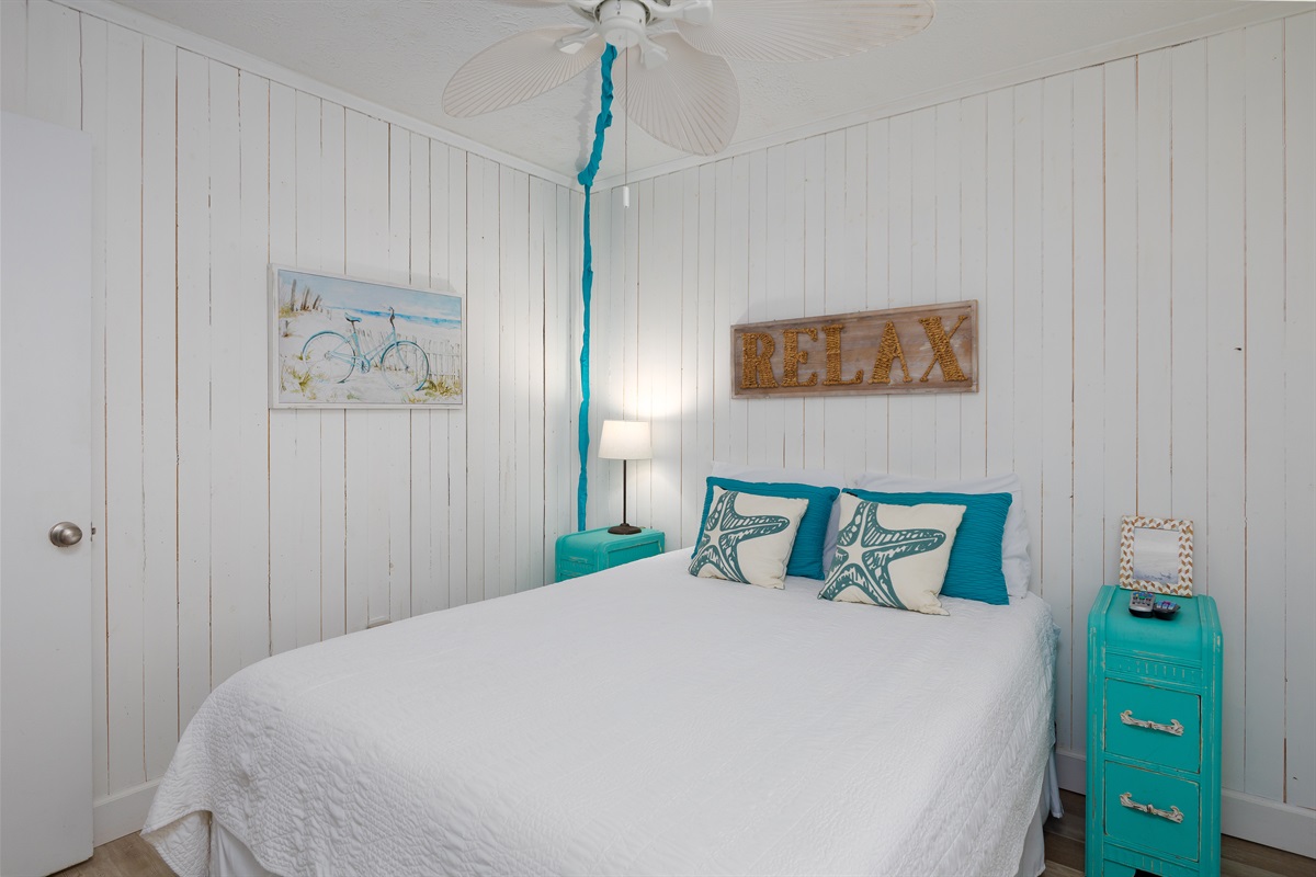 Queen-size bed in the master bedroom