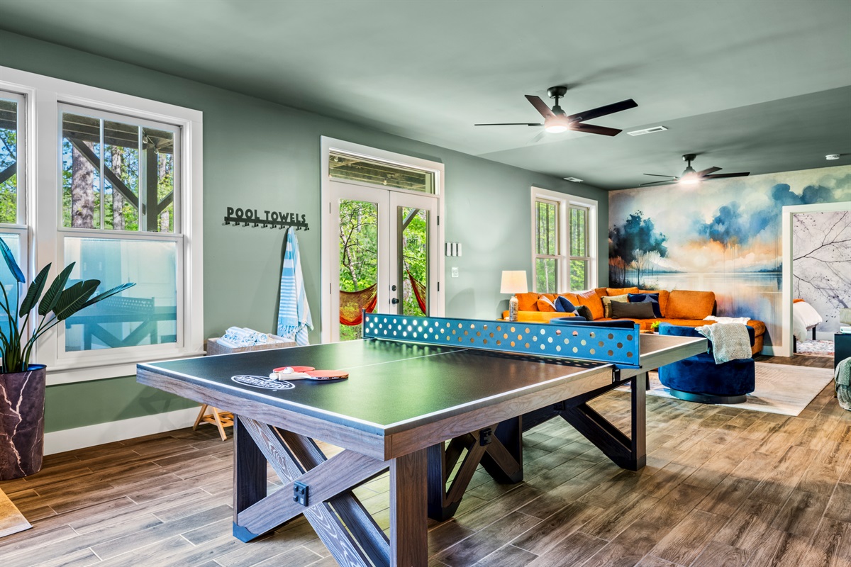 Challenge your crew to a ping pong tournament, then unwind just steps away in the open-concept living area. There’s space for everyone to play and relax.