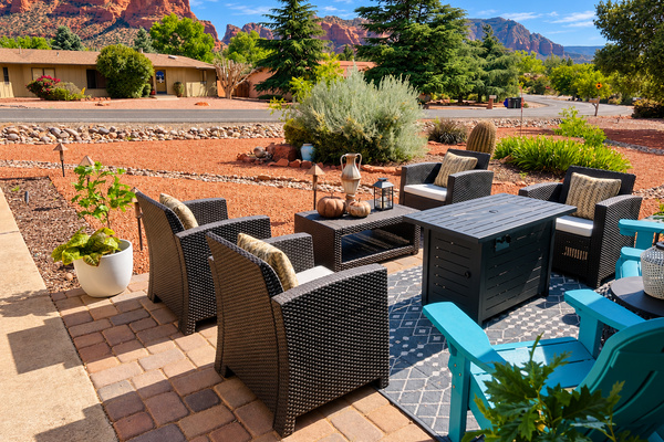Front yard outdoor dining area with iconic red rock views
