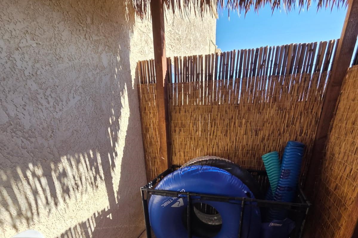 Extra pool toys in pool bathroom