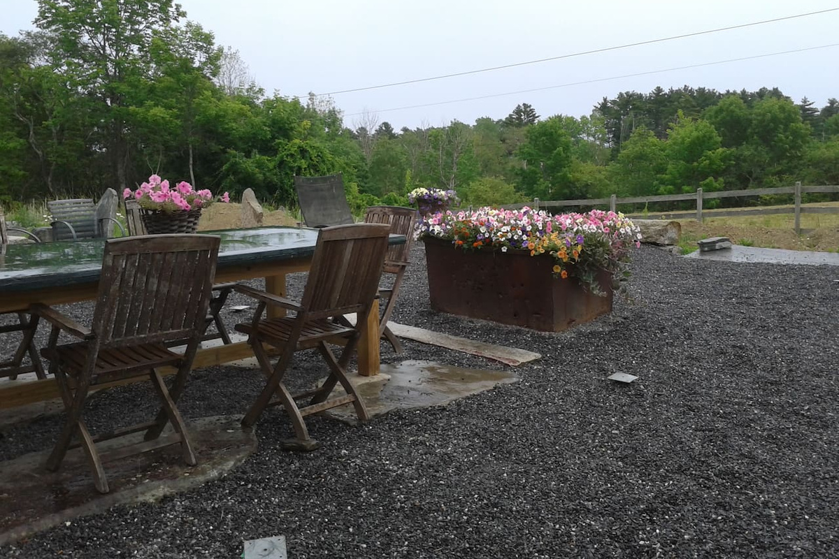 Outdoor dining table on terrace.