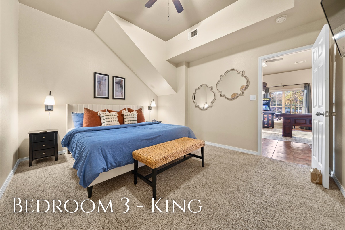 This spacious king room pairs soft, calming colors with plenty of natural light, creating a peaceful retreat where you can stretch out, relax, and enjoy slow mornings in comfort.