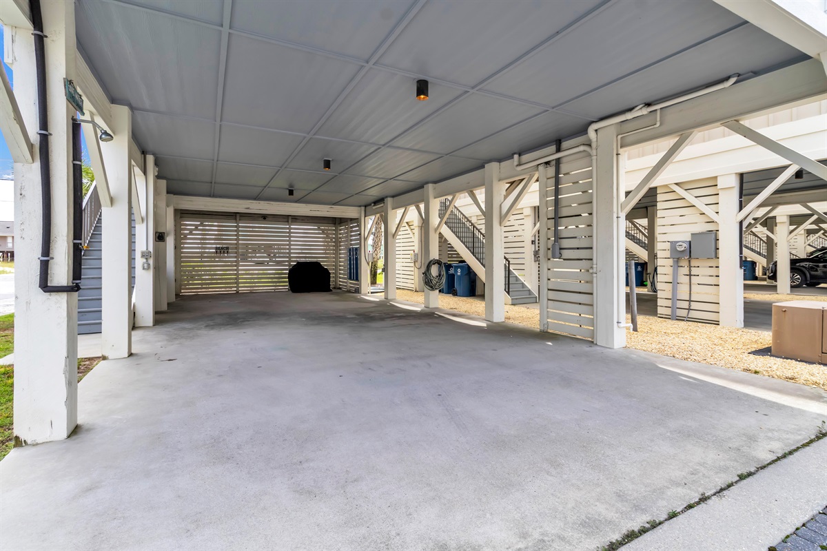 Can easily park 4 vehicles under the house. A large grill is provided for our guests use. The storage closet contains, boogie boards, sand toys,  beach chairs, and a beach umbrella. The beach equipment is all on the honor system. 