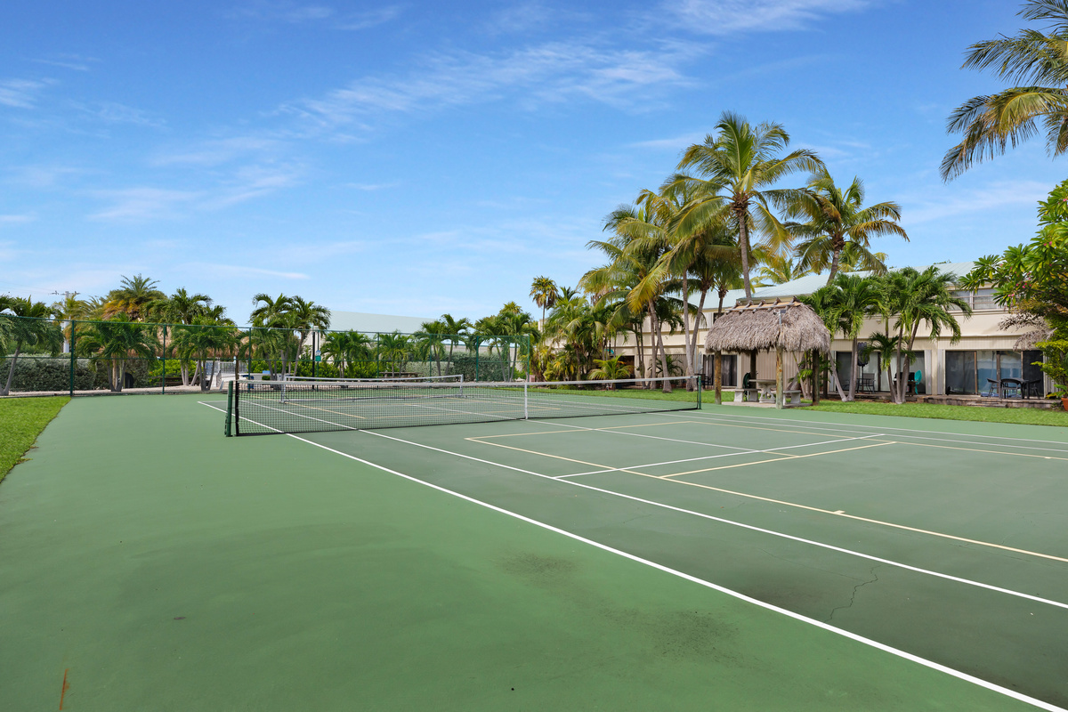Two tennis courts on the condo grounds
