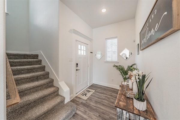 Entrance with stairs to upper floor