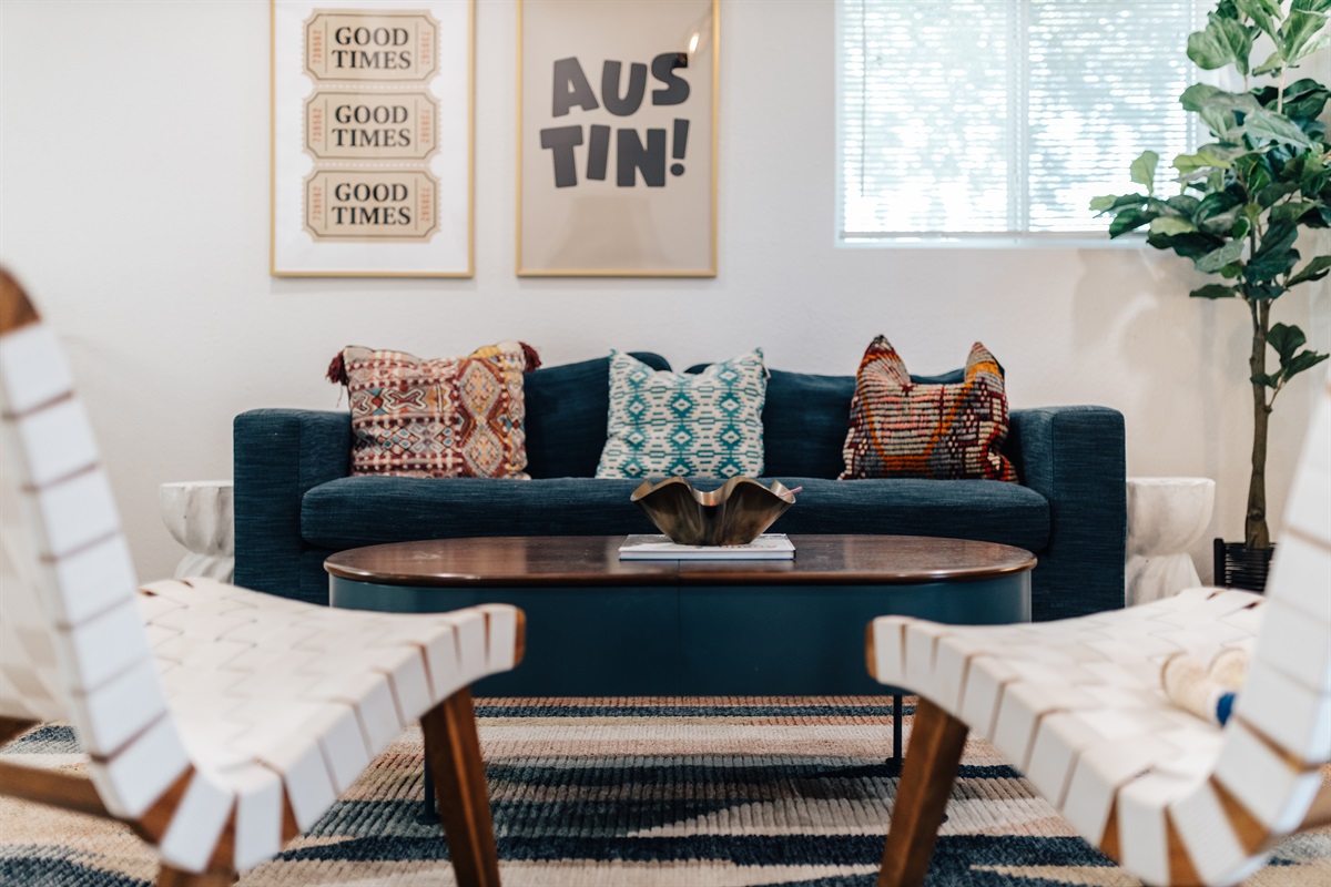 Living room has one pull over queen size sofa bed, chairs, big Tv for group to relax and recharge