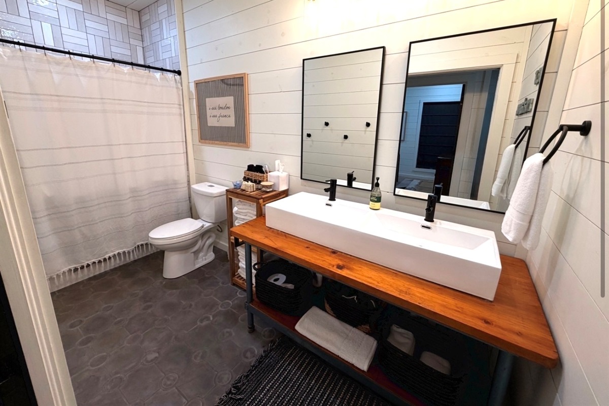 Spacious bathroom with double vanity—perfect for getting ready together
