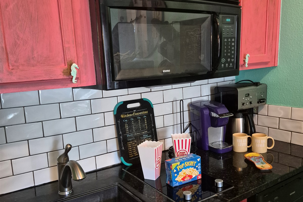 Well equipped kitchen, 2 burner cook top, microwave