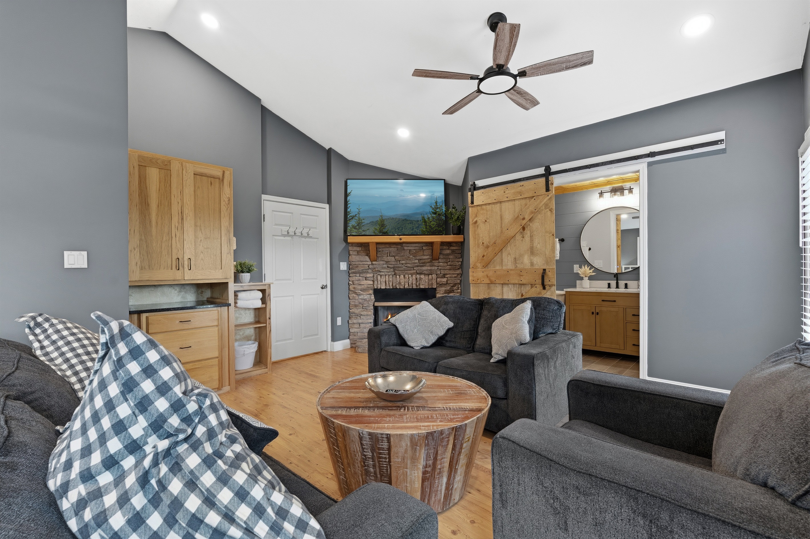 Master bedroom, fire place + reading area (folds out to bed) + king size bed