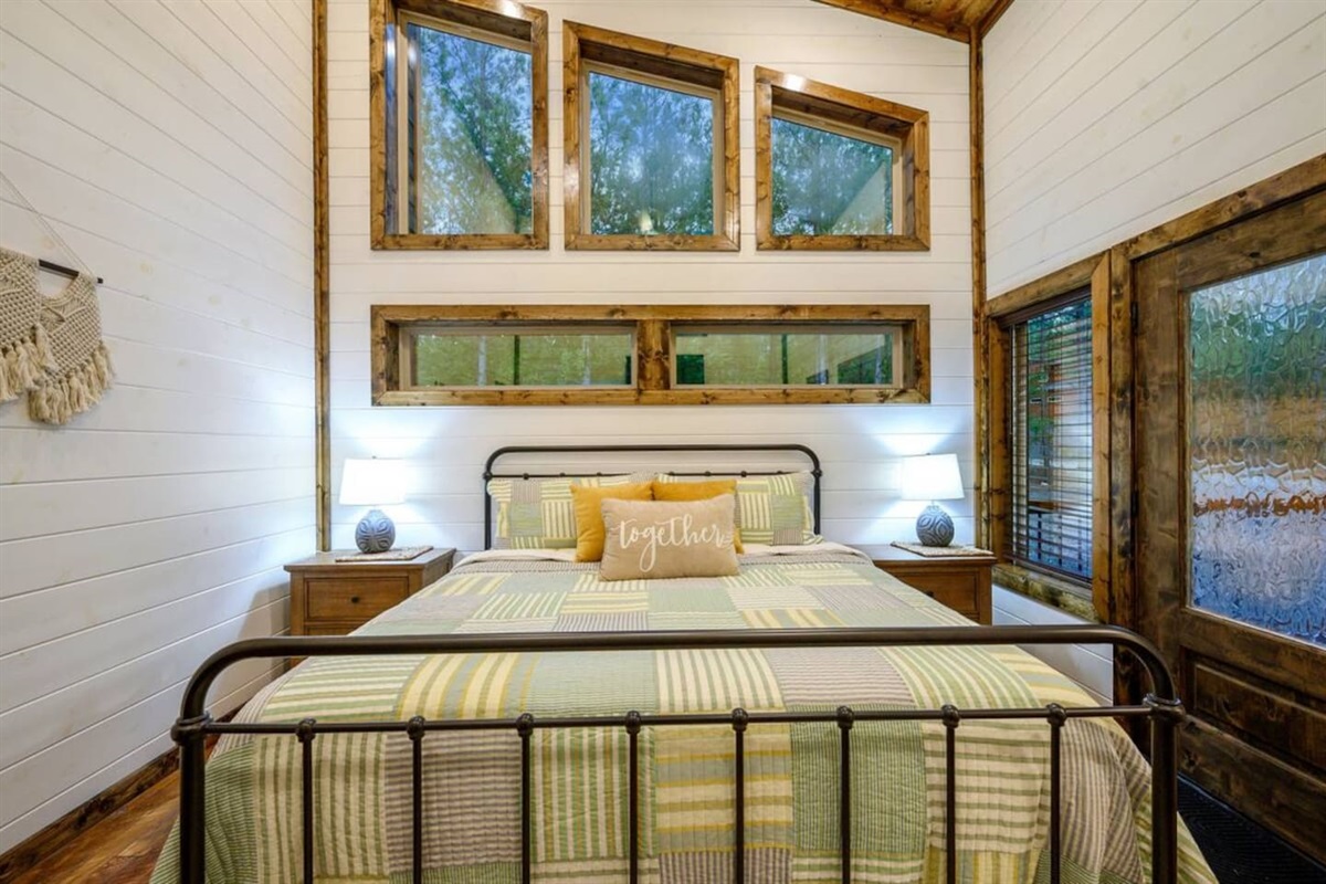 Fall asleep under the stars (almost)—our cozy rooms bring the outside in.