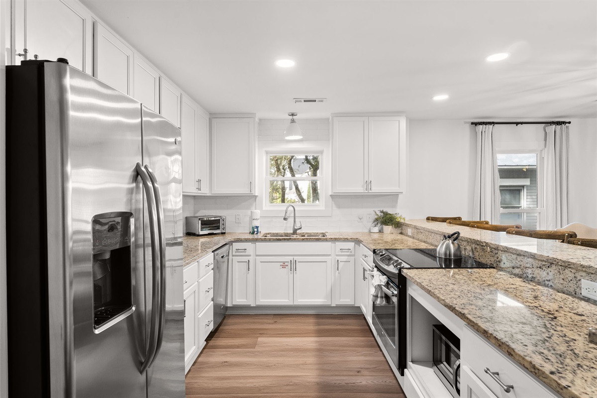 Side A 2nd Floor: A chef’s delight kitchen with a island and premium finishes.