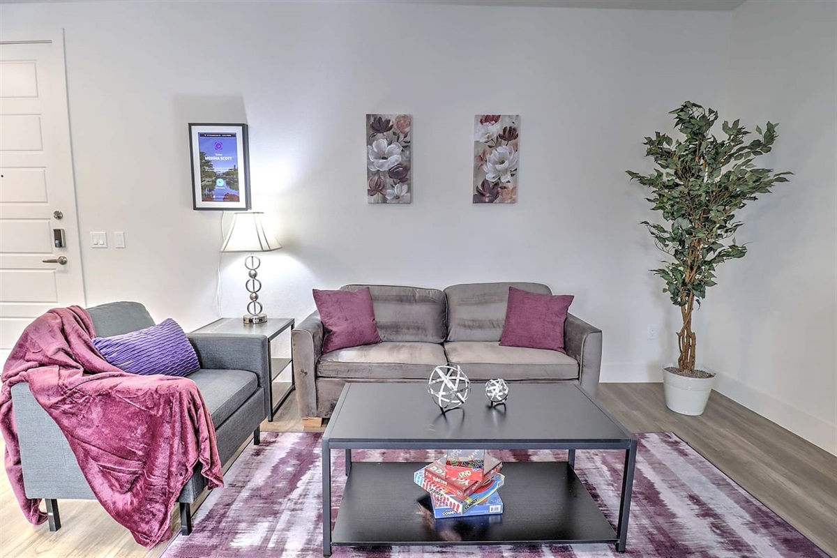 - Gather in a chic living area featuring soft sofas and stylish decor accents   - Enjoy movie nights or board games with friends in this inviting space   - Calming tones and warm lighting make it perfect for cozy relaxation