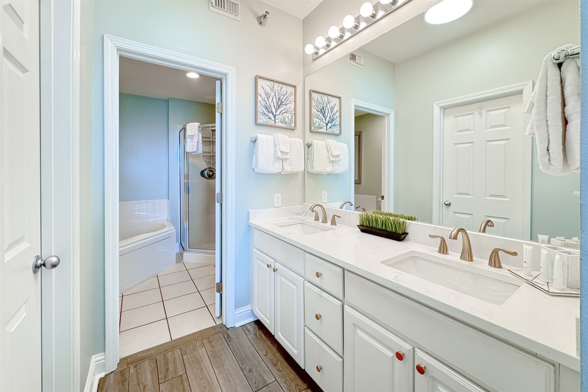 A well-appointed bathroom featuring convenient double sinks, offering ample space and functionality for daily routines.