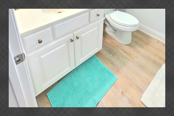 Upstairs bathroom with shower, sit down ledge in shower. 
Starter TP, shampoo, soap provided, towels and linens provided. Hair dryer provided. 