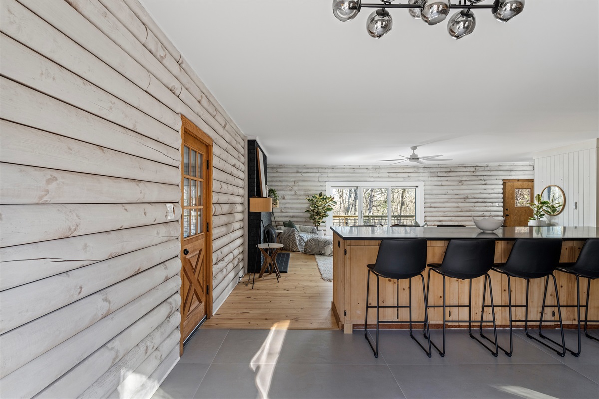 Living Room: Sunlit space with sleek design, perfect for relaxation or game nights!