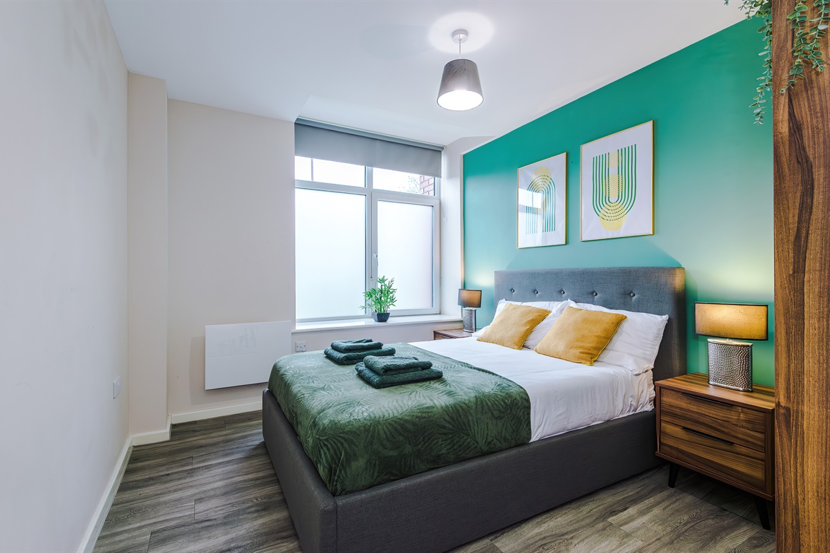 Bedroom 2 benefits from a hotel comfort large double bed, wardrobe with hangers & blackout blinds 