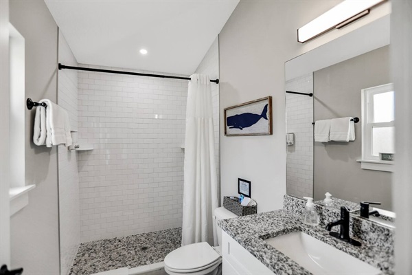 We love our en suite bathroom in our home.  The shower is easily accessible with virtually a no step entry to it.  We provide a toiletries starter kit of things that you will need during your stay.