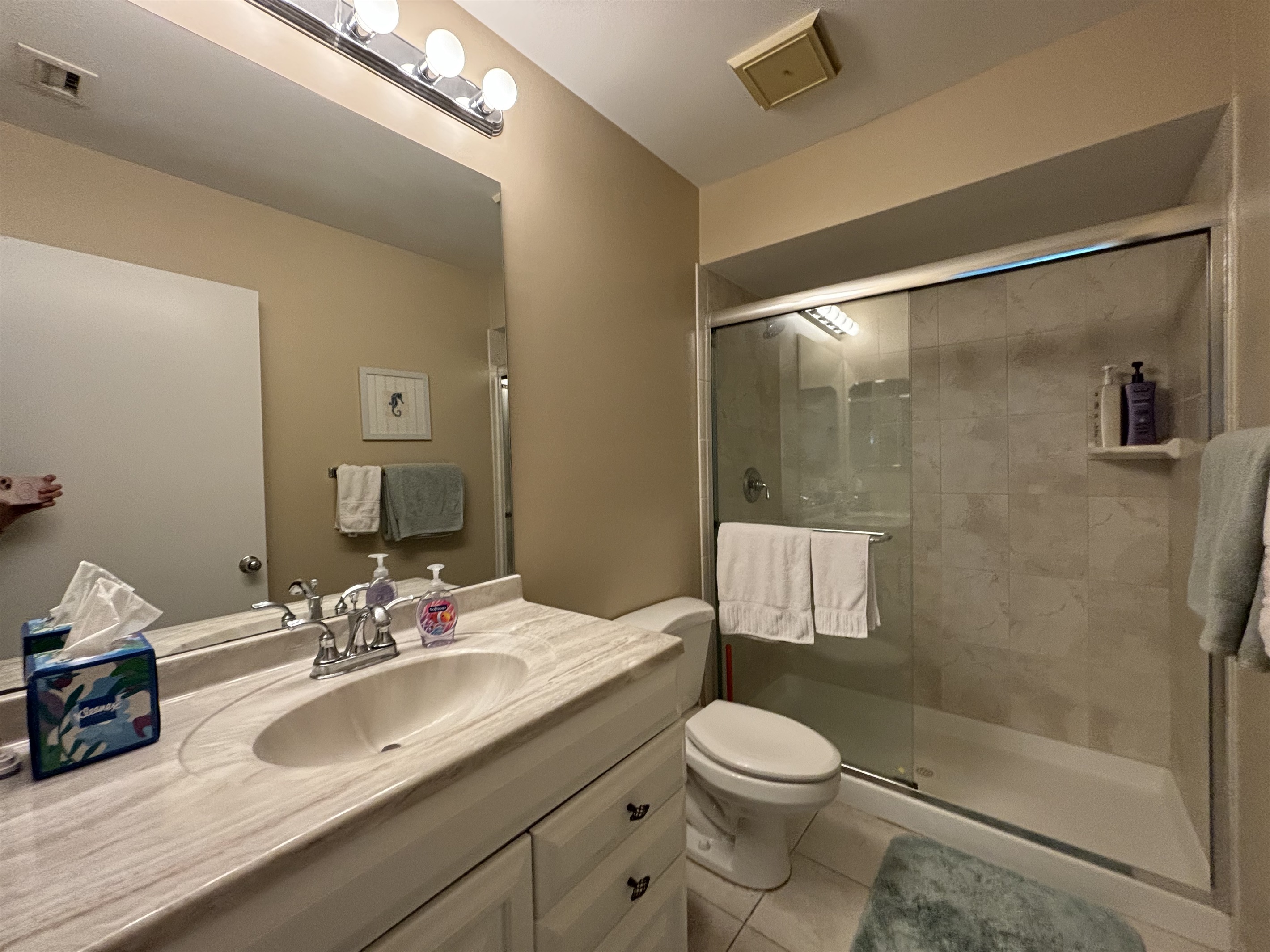 The master bathroom is located right off the master bedroom.