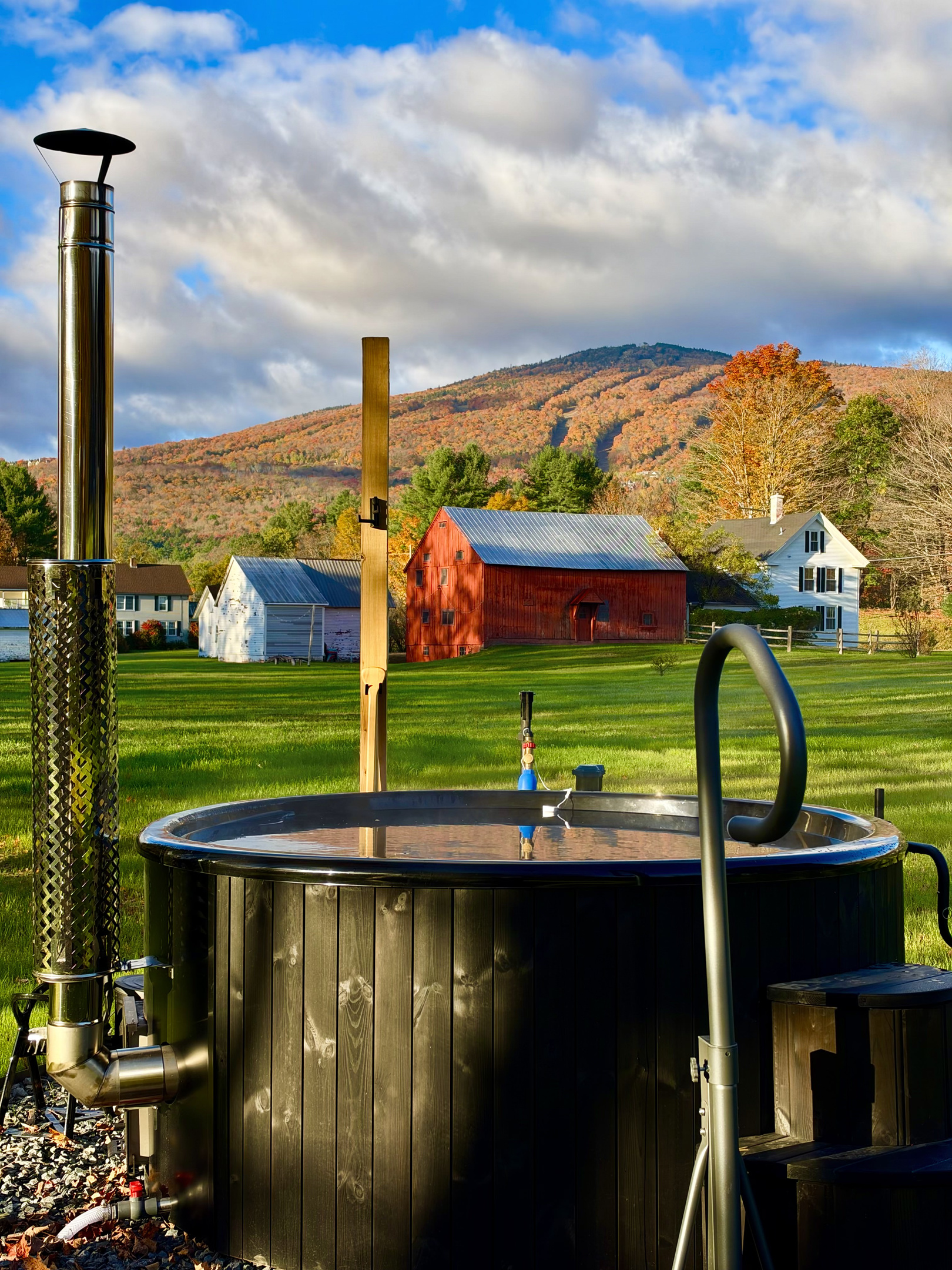 Book now if you like a good soak! Our wood fired hot tub has incredible views of Okemo. 