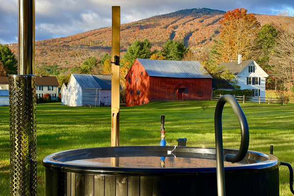 Book now if you like a good soak! Our wood fired hot tub has incredible views of Okemo. 