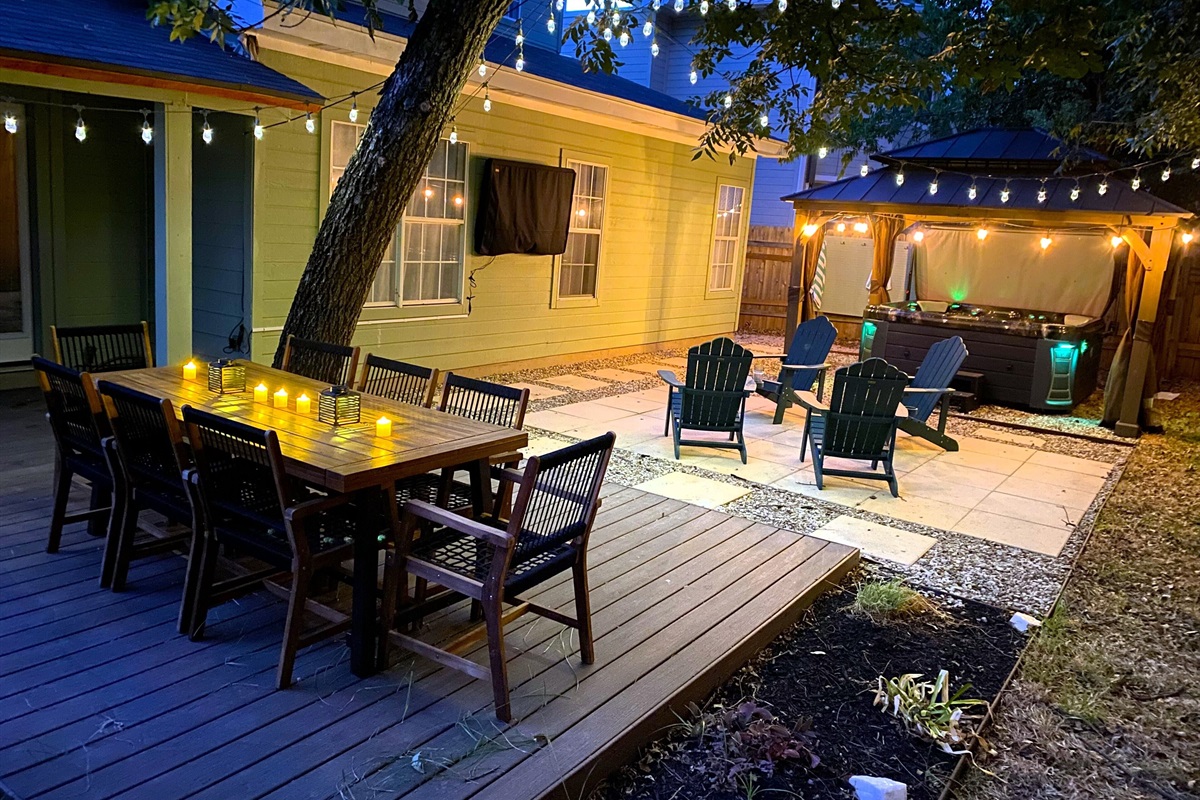 Dine outdoors beneath the gentle glow of string lights and candlelit lanterns. Our stylish patio setup creates a serene, inviting ambiance for memorable evenings. Enjoy a refined and relaxing experience in this beautiful open-air space.