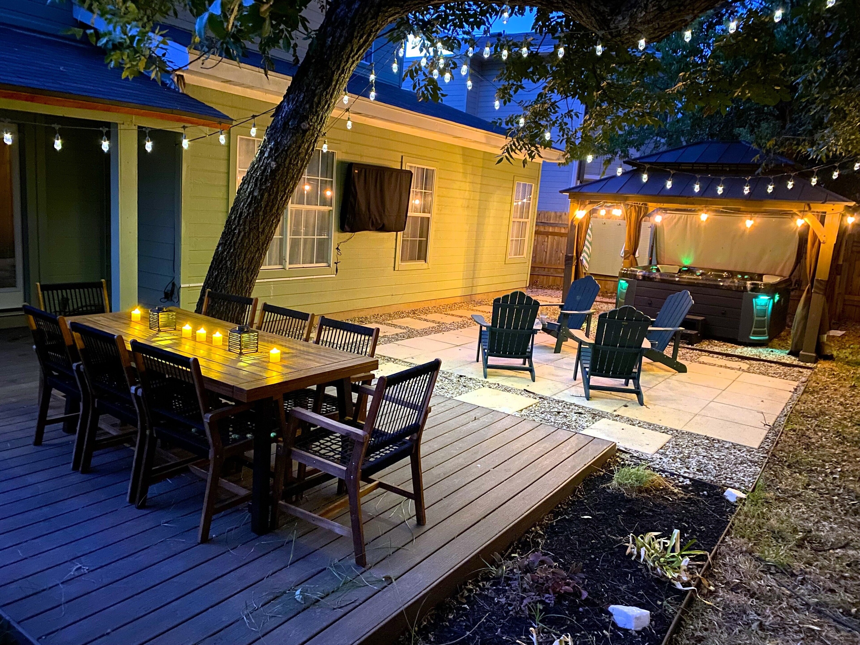 Dine outdoors beneath the gentle glow of string lights and candlelit lanterns. Our stylish patio setup creates a serene, inviting ambiance for memorable evenings. Enjoy a refined and relaxing experience in this beautiful open-air space.