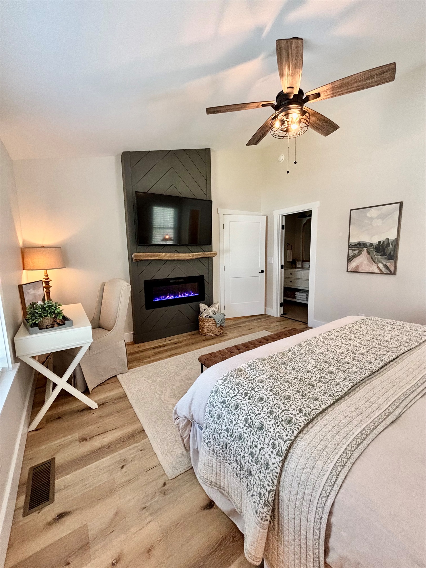 Smart TV and fireplace for the coziest vibes in this Master suite.  You'll never want to leave!